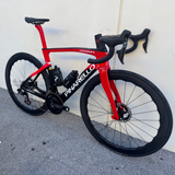 2022 Pinarello Dogma F B611 Black and Red- DuraAce Di2- Princeton Peak 4550 - 53  leaning against the wall at mack cycle 