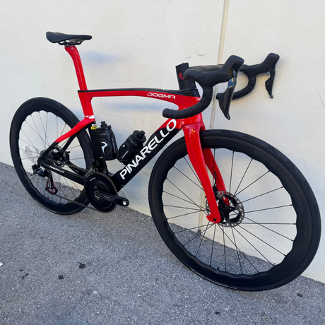 2022 Pinarello Dogma F B611 Black and Red- DuraAce Di2- Princeton Peak 4550 - 53  leaning against the wall at mack cycle 